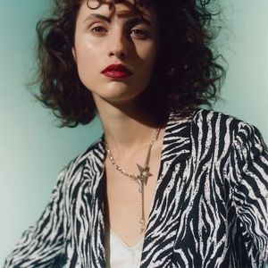 Fun silver necklace.